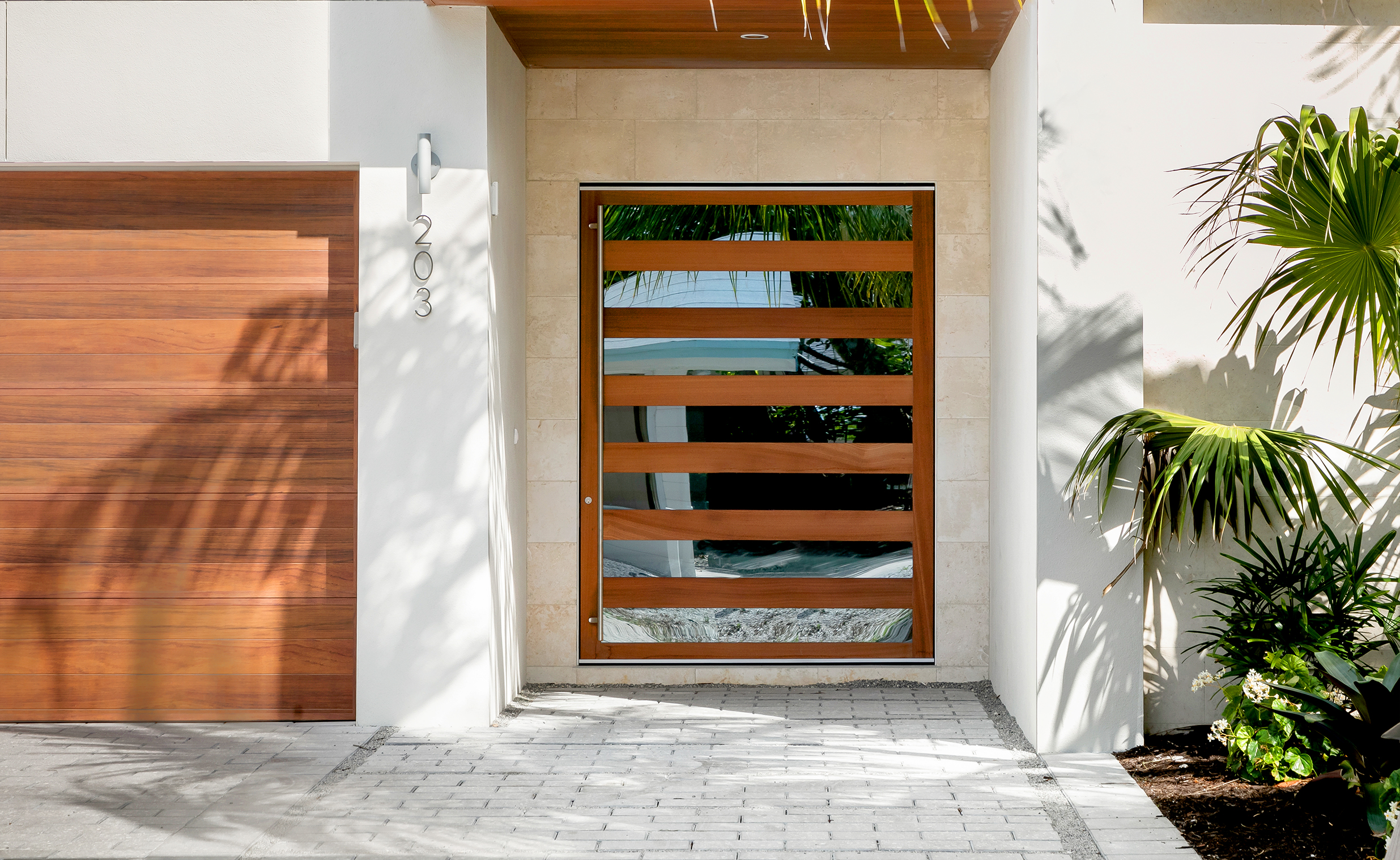 Impact pivot doors are an aesthetic addition to homes in Tampa Bay and St. Pete Florida