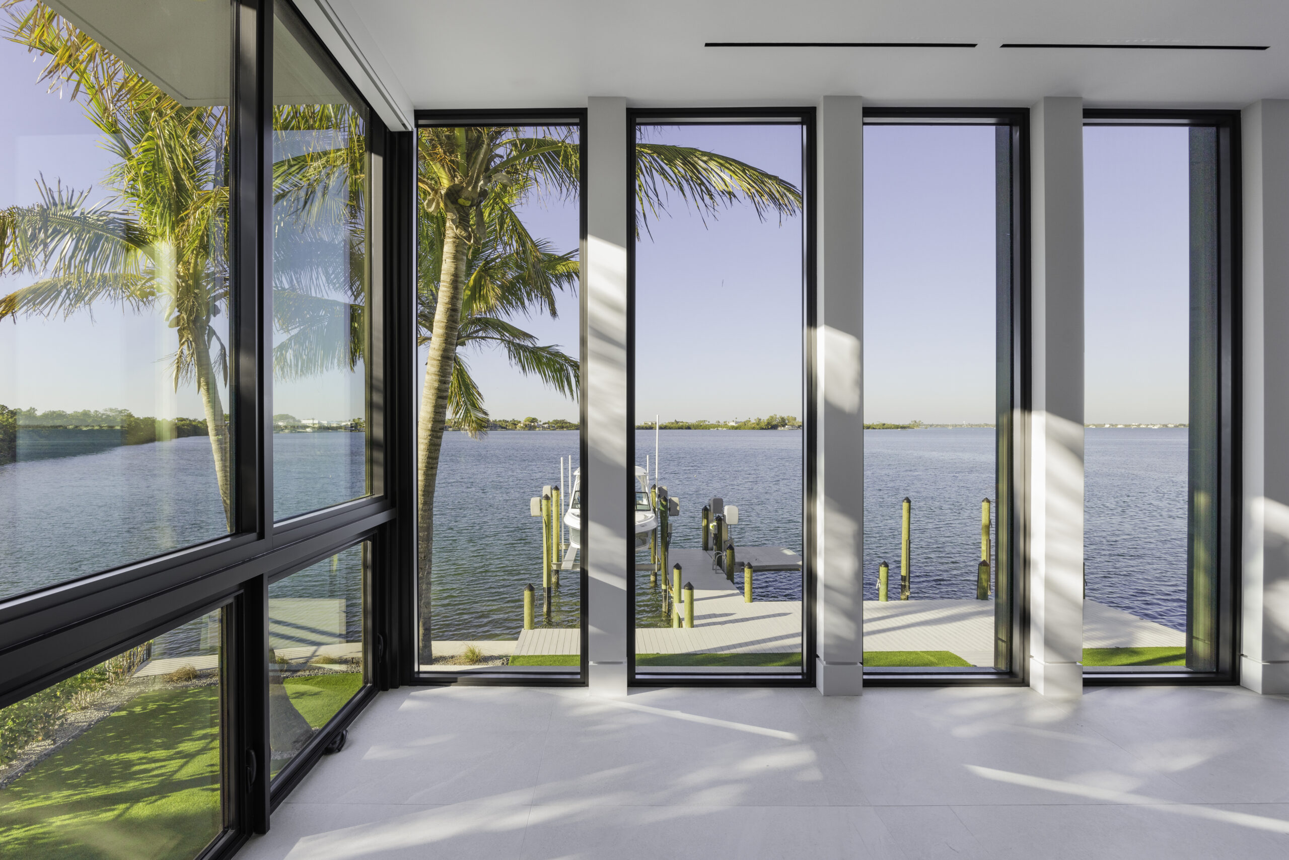 Impact picture windows for an unobstructed water view