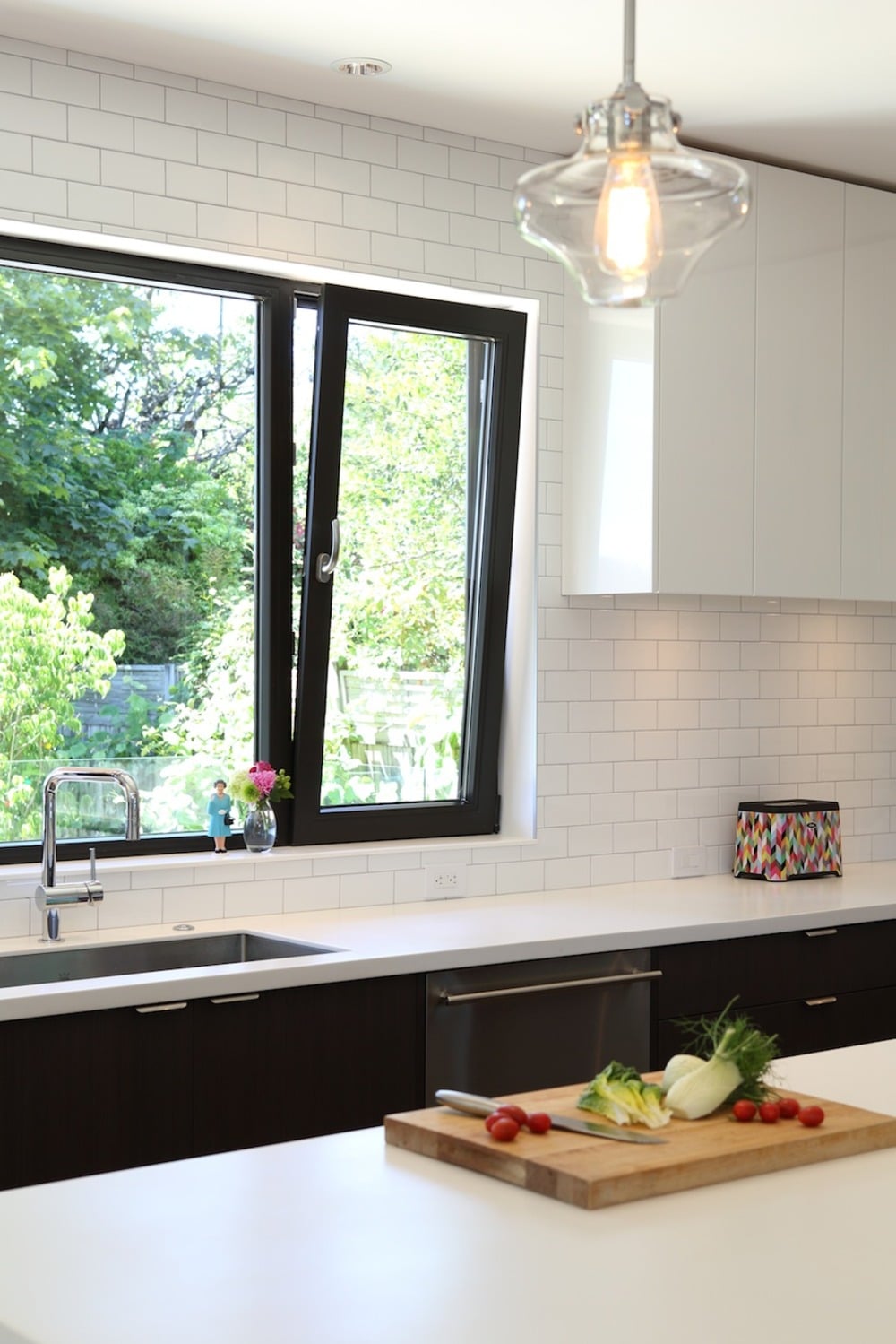 Black tilt and turn window in a modern kitchen